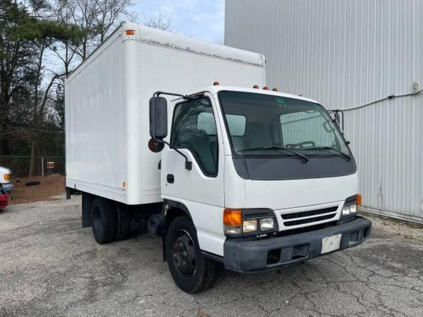 1999 white /gray Isuzu NPR (4KLC4B1R8XJ) with an 5.7 GAS V8 engine, Auto transmission, located at 5700 Curlew Drive, Norfolk, VA, 23502, (757) 455-6330, 36.841885, -76.209412 - -1999 Isuzu NPR 61k -Ready to work! -V8 gas motor -6 like new tires with great tread -12 ft box with roll up door -Tommy gate has been removed -No issues, runs and drives great -New state inspection -VADLR $250 processing fee. No other dealer fees. - Photo#2